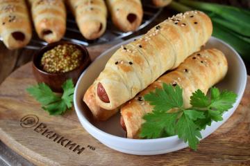 Sausages in puff yeast dough