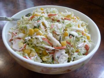 A simple salad with crab sticks and cabbage