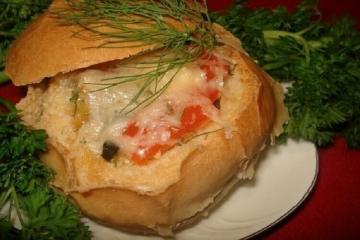 Hot buns stuffed with mushrooms, cheese and tomatoes