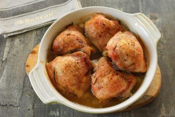Chicken thighs with garlic in the oven