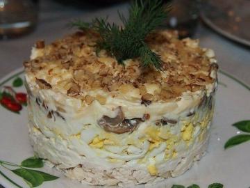 Salad "White dance" with chicken, mushrooms and nuts on New Year's Eve 2019