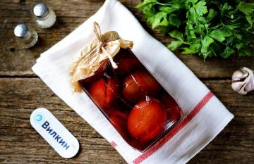 Pickled plums with garlic