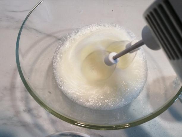 Mixer begin whipping whites and add sugar