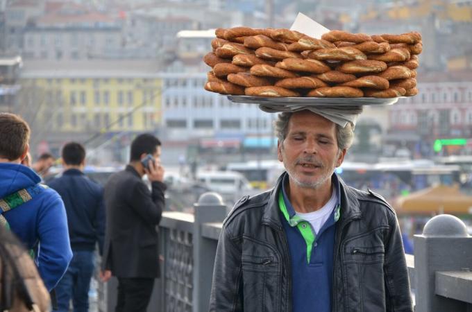 Street vendor rolls simit
