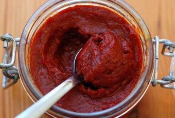 How do I make the tomato paste with the garlic for the winter. favorite recipe