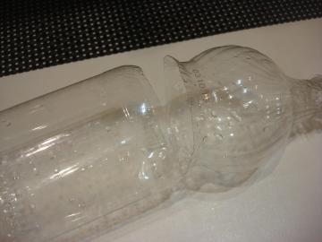 Minute "invention" from any plastic bottle, which will save the fingers from being cut with a knife shredder.