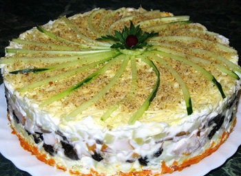 Layered salad with chicken and prunes. Favorite on any holiday!