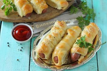 Sausages in dough with cheese