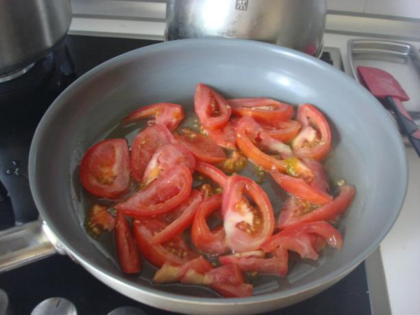 Picture taken by the author (posted chopped tomatoes into the pan)
