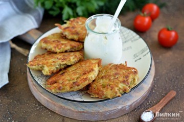 Potato pancakes with minced meat in a pan