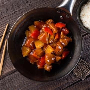 Pork in sweet and sour sauce in Chinese with pineapple
